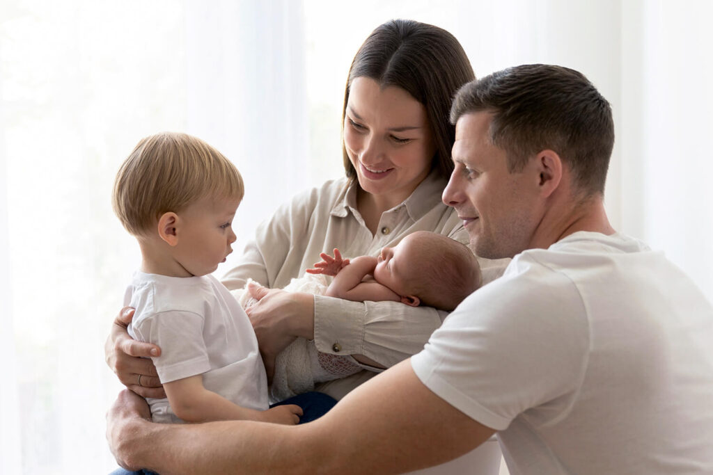 Newborn Photos with Siblings: Why an At-Home Session Is Easier for the Whole Family